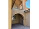 Covered patio with decorative archway provides a private outdoor space, great for relaxing or entertaining at 12277 Bluebird Canyon Pl, Las Vegas, NV 89138