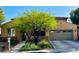 Charming single-story home featuring manicured landscaping and a two-car garage at 12277 Bluebird Canyon Pl, Las Vegas, NV 89138