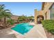 Inviting pool and spa surrounded by mature landscaping and a private patio at 12277 Bluebird Canyon Pl, Las Vegas, NV 89138