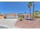 Charming single-story home featuring a three-car garage and low-maintenance desert landscaping at 1596 Fieldbrook St, Henderson, NV 89052