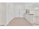 Bright foyer featuring tile flooring and double doors to the living area at 1596 Fieldbrook St, Henderson, NV 89052