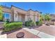 Attractive front entrance featuring a brick walkway and neatly landscaped bushes at 1596 Fieldbrook St, Henderson, NV 89052