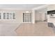 Open-concept living area with tile and carpet, seamlessly connected to other spaces at 1596 Fieldbrook St, Henderson, NV 89052