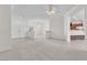 Open-concept living room with tile flooring leading to carpet, bright and spacious at 1596 Fieldbrook St, Henderson, NV 89052