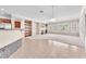 Open-concept floor plan with a fireplace, built-in shelves, and seamless transitions at 1596 Fieldbrook St, Henderson, NV 89052