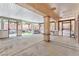 Spacious covered patio featuring concrete flooring and open views of the landscaped backyard at 1596 Fieldbrook St, Henderson, NV 89052