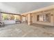 Large covered patio space perfect for outdoor entertaining with concrete floors and ample seating at 1596 Fieldbrook St, Henderson, NV 89052