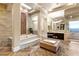 Luxurious bathroom showcasing a soaking tub, dual vanities, and stylish fixtures at 23 Quiet Moon Ln, Las Vegas, NV 89135