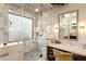 Modern steam shower with marble tiles, glass enclosure, and built-in bench at 23 Quiet Moon Ln, Las Vegas, NV 89135