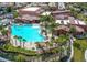 An aerial view of the community pool, hot tub, and surrounding landscaping at 257 Via Franciosa Dr, Henderson, NV 89011