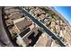 An aerial view of a residential neighborhood with mature landscaping, solar panels, and well-maintained streets at 257 Via Franciosa Dr, Henderson, NV 89011