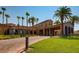 An exterior shot of the Tuscany community clubhouse and landscaping at 257 Via Franciosa Dr, Henderson, NV 89011