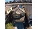 Aerial view showcasing a two-story home with desert landscaping, a two car garage and solar panels at 257 Via Franciosa Dr, Henderson, NV 89011