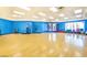 A gym space equipped with yoga equipment and a hardwood floor at 257 Via Franciosa Dr, Henderson, NV 89011