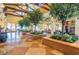 Lobby area featuring tile flooring, trees, and exposed wood beams at 257 Via Franciosa Dr, Henderson, NV 89011