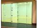 A racquetball court with a hardwood floor and a glass-enclosed viewing area at 257 Via Franciosa Dr, Henderson, NV 89011