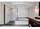 Bright bathroom featuring a glass shower and separate soaking tub at 2700 Las Vegas Blvd # 3507, Las Vegas, NV 89109