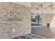 Sky Las Vegas entrance with stone walls and modern glass doors for a luxurious welcome at 2700 Las Vegas Blvd # 3507, Las Vegas, NV 89109
