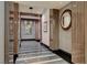 Elegant hallway with decorative mirrors, wood accents, and stylish lighting at 2700 Las Vegas Blvd # 3507, Las Vegas, NV 89109