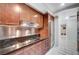 Modern kitchen featuring sleek wood cabinetry, stainless steel appliances, and stylish countertops at 2700 Las Vegas Blvd # 3507, Las Vegas, NV 89109