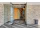 Grand lobby entrance with stone walls and modern glass doors for a luxurious welcome at 2700 Las Vegas Blvd # 3507, Las Vegas, NV 89109