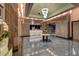 Grand lobby featuring marble floors, wood columns, modern lighting, and a welcoming reception area at 2700 Las Vegas Blvd # 3507, Las Vegas, NV 89109