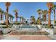 Beautiful pool area surrounded by palm trees and comfortable lounge chairs for relaxation at 2700 Las Vegas Blvd # 3507, Las Vegas, NV 89109