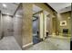 Elegant shower room featuring tiled walls, multiple shower stalls, and accessible design elements at 2700 Las Vegas Blvd # 3507, Las Vegas, NV 89109