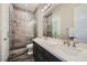 Beautiful bathroom with a glass shower, double sinks, and modern fixtures at 294 Besame Ct, Las Vegas, NV 89138