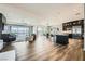 Open-concept living area flows into the kitchen and dining space with access to outdoor seating at 294 Besame Ct, Las Vegas, NV 89138