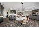 Open living space with a view of the island, kitchen, living room, and dining area, creating a comfortable home at 294 Besame Ct, Las Vegas, NV 89138