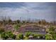 Aventura Park sign with baseball field in background and desert landscaping in the foreground at 3165 Brynley Ave, Henderson, NV 89044