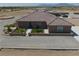Charming single-story home featuring a tile roof and a well-maintained front yard with tasteful landscaping at 3181 W Bell Vista Ave # 2, Pahrump, NV 89060
