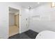 Luxurious bathroom showcases marble tile, gold fixtures, and a modern shower at 3672 Madrid St, Las Vegas, NV 89121