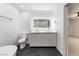 Modern bathroom features double sinks, ample counter space, and an LED-lit mirror at 3672 Madrid St, Las Vegas, NV 89121