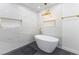 Modern bathroom featuring a soaking tub, gold fixtures, and elegant tile work at 3672 Madrid St, Las Vegas, NV 89121