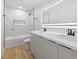 Contemporary bathroom with double sinks, a sleek mirror, and stylish tiled shower at 3672 Madrid St, Las Vegas, NV 89121