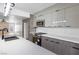 Modern kitchen boasts sleek countertops, stainless appliances, and stylish two-tone cabinetry at 3672 Madrid St, Las Vegas, NV 89121