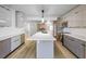 Modern kitchen with a center island, sleek cabinets, and stainless steel appliances at 3672 Madrid St, Las Vegas, NV 89121