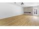 Spacious living room showcases a modern fireplace and light wood-look flooring at 3672 Madrid St, Las Vegas, NV 89121