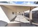 Covered patio leading to low-maintenance backyard with gravel ground cover at 3672 Madrid St, Las Vegas, NV 89121