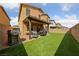 Spacious backyard features a covered patio area perfect for outdoor dining at 3835 Berenices Ave, North Las Vegas, NV 89084