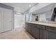 Large bathroom features double sinks, walk in shower, and walk in closet at 3835 Berenices Ave, North Las Vegas, NV 89084
