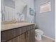 Bathroom featuring a vanity with stone countertop and neutral colored walls at 3835 Berenices Ave, North Las Vegas, NV 89084