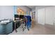Spacious bedroom with ample closet space, featuring a comfortable sitting area at 3835 Berenices Ave, North Las Vegas, NV 89084