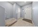 Inviting entryway with tile flooring, neutral paint and a view of the front door at 3835 Berenices Ave, North Las Vegas, NV 89084