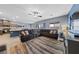 Spacious living room seamlessly connecting to the kitchen, perfect for entertaining at 3835 Berenices Ave, North Las Vegas, NV 89084
