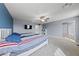 This spacious main bedroom has an accent wall, an ensuite bathroom, and a walk in closet at 3835 Berenices Ave, North Las Vegas, NV 89084