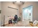 Another view of this home office with a desk, chair, and a comfortable couch at 4273 Sunrise Flats St, Las Vegas, NV 89135