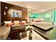 Stylish bedroom boasting hardwood floors, a comfortable sofa, and a luxurious king-sized bed at 4381 W Flamingo Rd # 12304, Las Vegas, NV 89103